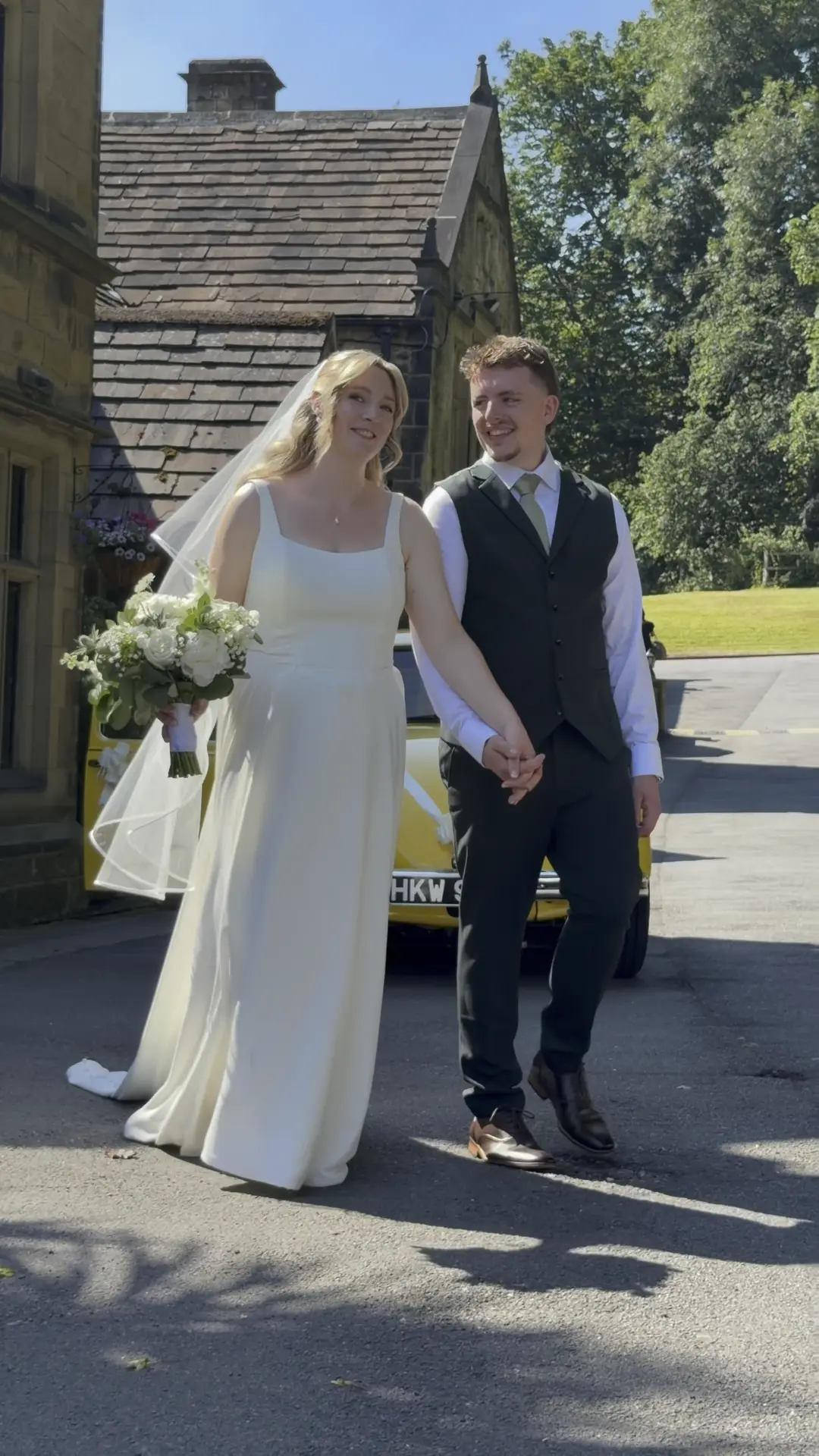 Laura walking through a wedding, filmed vertically